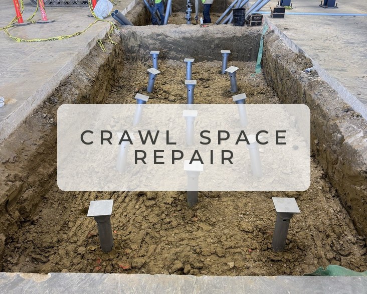 Helical piers installed to support and repair a foundation crawl space