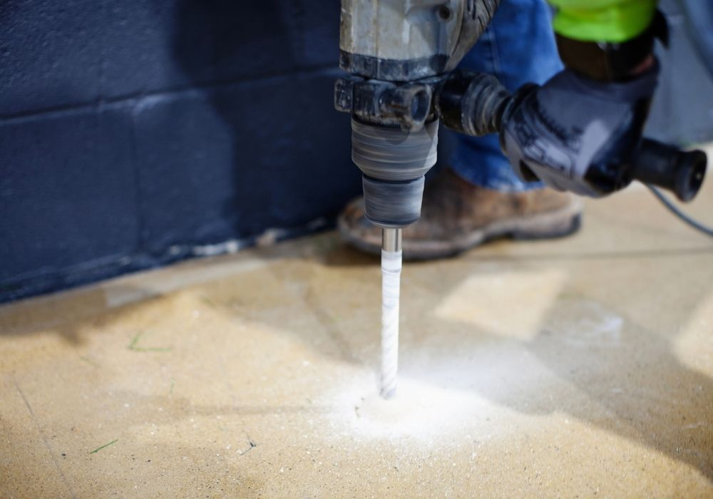 hammer drill concrete slab drilling