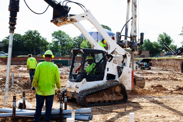 FnD Piers helical pier drilling rig at work on a foundation excavation