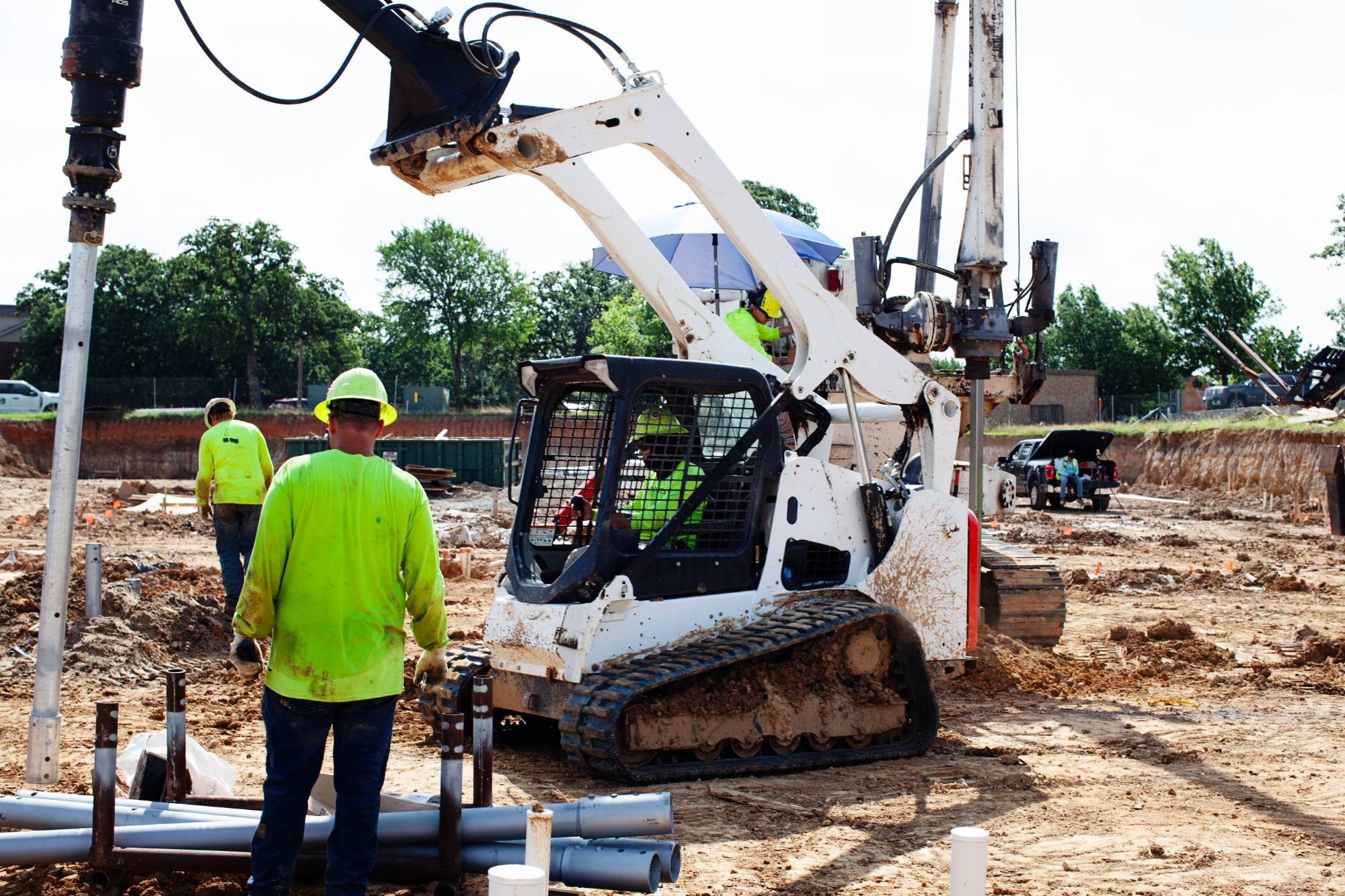 FnD Piers helical pier drilling rig at work on a foundation excavation
