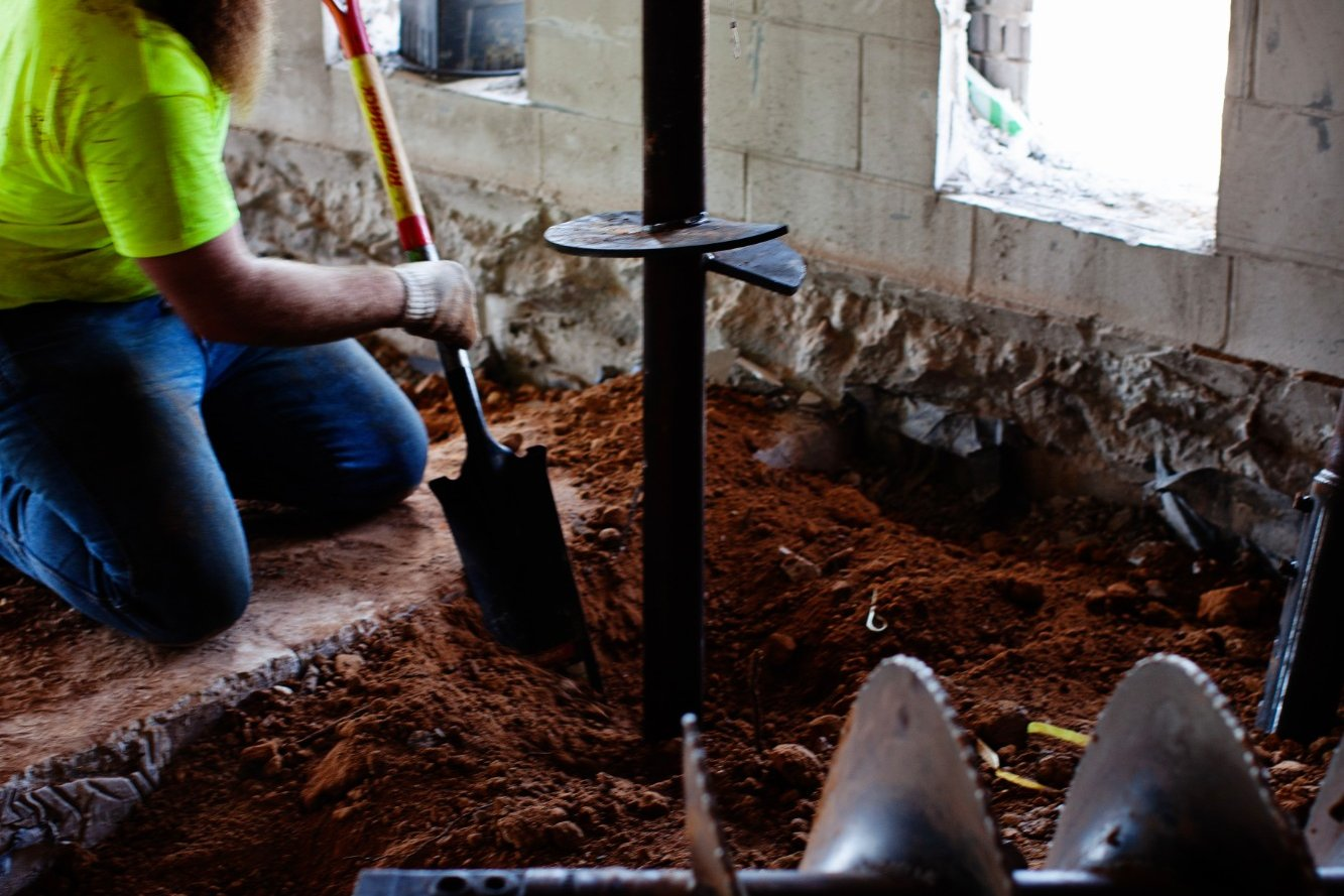 FnD Piers helical pier installed beneath an existing structure's crawl space, serving Weatherford, TX